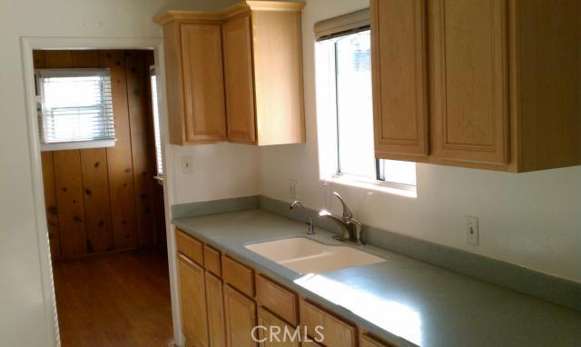 location!location!!location!!!Freshly painted in & out. Beautiful home in pride of ownership area,features hardwood flooring on raised foundation,cozy fireplace,newer windows,remodeled bath with granite,tile & kitchen with corian countertops & lots of cabinetry. 2 car attached garage with washer & dryer hook -ups and garage door opener.Hurry won't last.