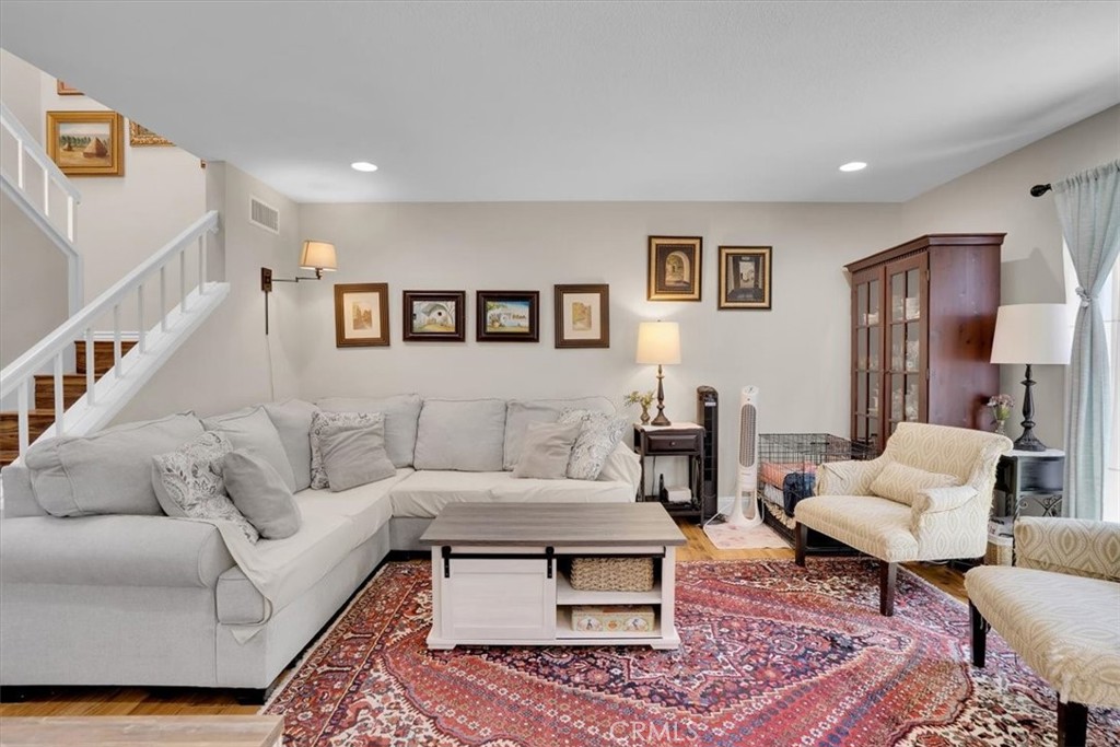 Welcome to 12 Sparrow Hill Lane, a beautifully updated single-family attached home in the heart of Laguna Hills. This 3-bedroom, 2.5-bath home features new flooring, recently replaced windows, a private outdoor patio, and a 2-car attached garage with an EV charger. Located in a friendly and well-maintained community, residents enjoy nearby access to parks, shopping, dining, and the Laguna Hills Community Center, which offers a variety of recreational and cultural activities. With top-rated schools, convenient freeway access, and a shared walkway for added charm, this home offers the perfect blend of comfort, location, and lifestyle.