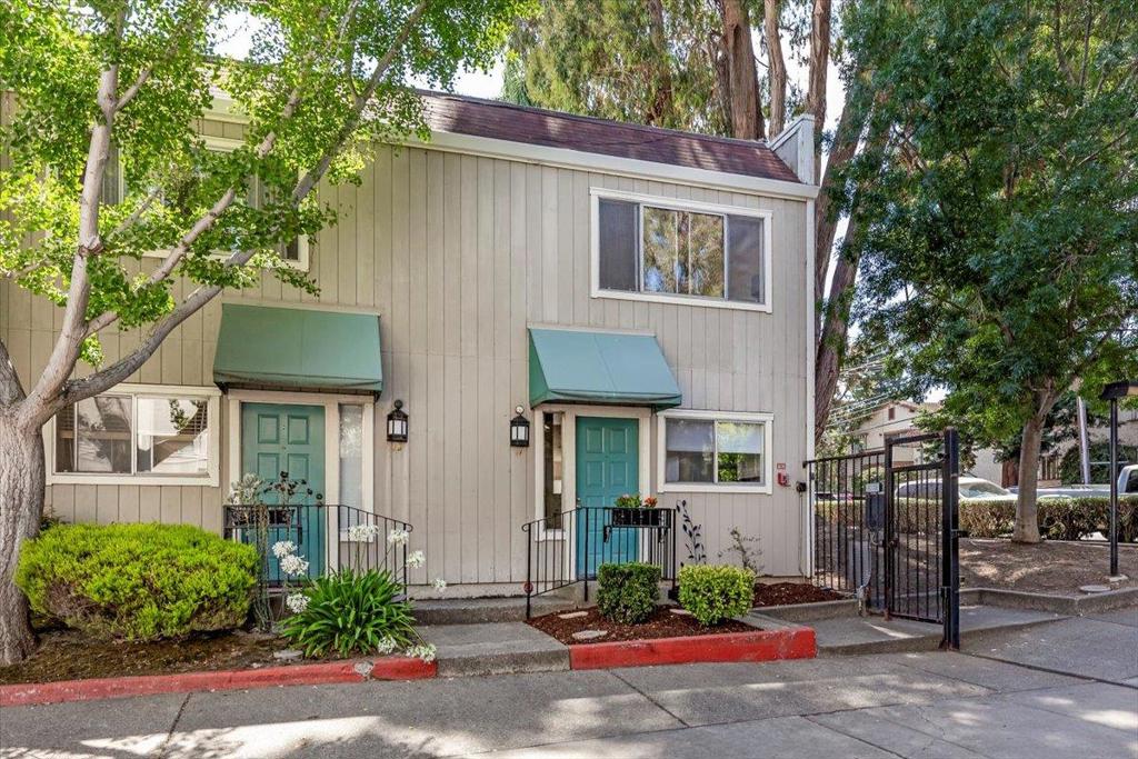Welcome to this charming 2-bedroom, 1.5-bathroom townhome located in the Willows in Menlo Park. The spacious living room with fireplace is the centerpiece of the open floorplan on the main floor that includes a dining area, kitchen, half bath and new laminate flooring throughout. The newly updated kitchen features quartz countertops, and stainless steel appliances. There are dual skylights that illuminate both the stairs and upstairs where you'll find both bedrooms, a centrally located bathroom with a shower over a Jacuzzi tub, and laundry area with side by side washer and dryer. The large primary bedroom offers a walk-in closet, built-in speakers, and a custom wet bar with mini fridge. New carpets and paint complete this fresh makeover. Relax on your patio or enjoy the community pool. The assigned covered parking space #13, behind the gated entrance, is just steps from your front door and additional parking for a second vehicle is available on a first-come basis. This 28 unit complex has a great location west of 101, close to parks, schools, downtown Menlo Park and Palo Alto, with easy access to Caltrain, SFO, and all the major Tech companies. Take a look at this wonderful opportunity!