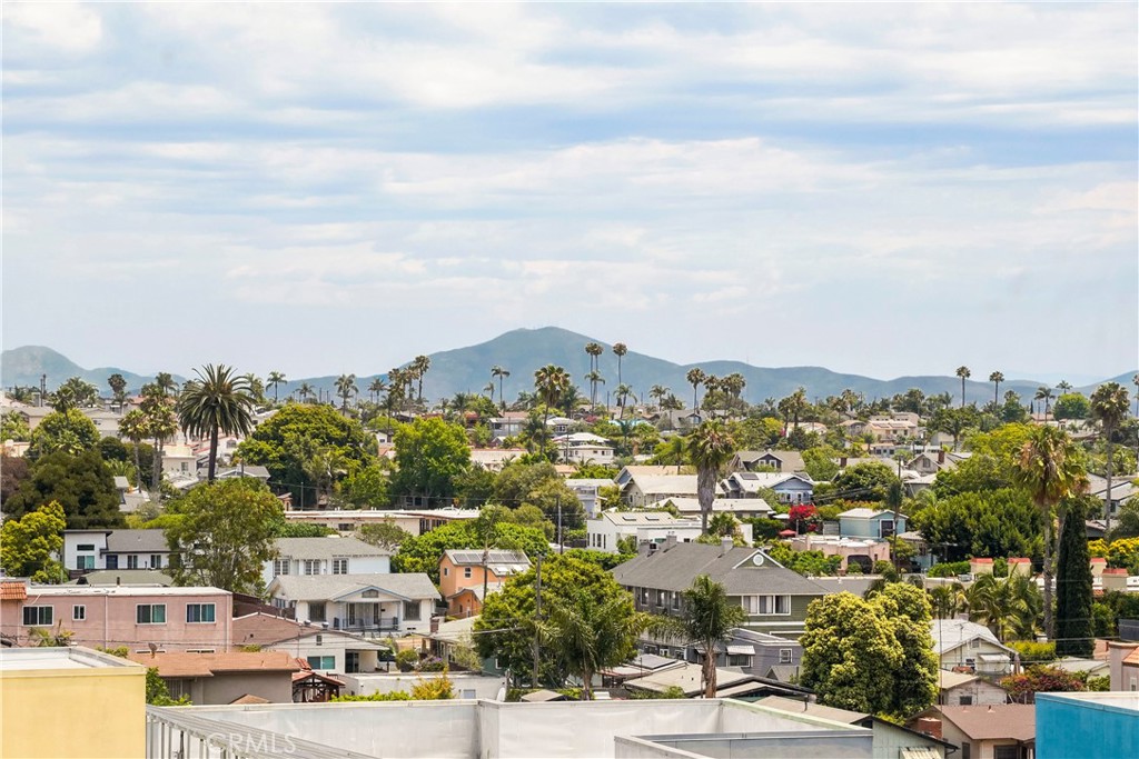 Amazing Views in the heart of uptown! Welcome to this light-filled 2 bedroom, 2 bathroom condo offering stunning views and an unbeatable central location. Just one mile from the iconic signs of University Heights, Hillcrest, and North Park, and equally close to Balboa Park and the San Diego Zoo.The open floor plan features a spacious living area that opens to a private balcony facing east to capture epic sun & moon rises. Close proximity to San Diego's best restaurants, cafes, breweries and the legendary Hillcrest Farmers Market. 2 parking spots, One in garage.