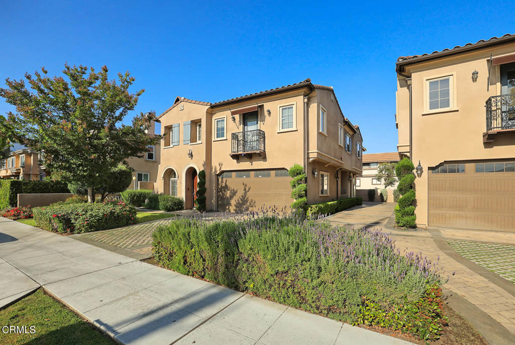 A lovely and luxurious space to call home in the acclaimed Arcadia school district! Don't miss this two-story townhome, privately nestled at the back of a 4-unit community. Downstairs, you'll find the living room, dining room, well-appointed kitchen with included stainless steel appliances - refrigerator, dishwasher, gas cooktop - and around the corner, the in-unit laundry and guest bath. Upstairs, are the three spacious bedrooms, each with their own attached bathroom! The primary suite is large and inviting, with a lovely window seat, walk-in closet and generously-sized bathroom with jetted tub. Enjoy some sunshine, fresh air and fresh fruit trees outside in the small back garden. Perfect for those looking for a comfortable, low-maintenance home. The attached 2-car garage with side-by-side parking is large enough for your cars and SUVs. Bonus features: tankless water heater, water softener and there's even a storage area alongside the rear of the house. This wonderful townhome is conveniently located a short distance to grocery stores, shops, restaurants, entertainment and all that Arcadia has to offer.