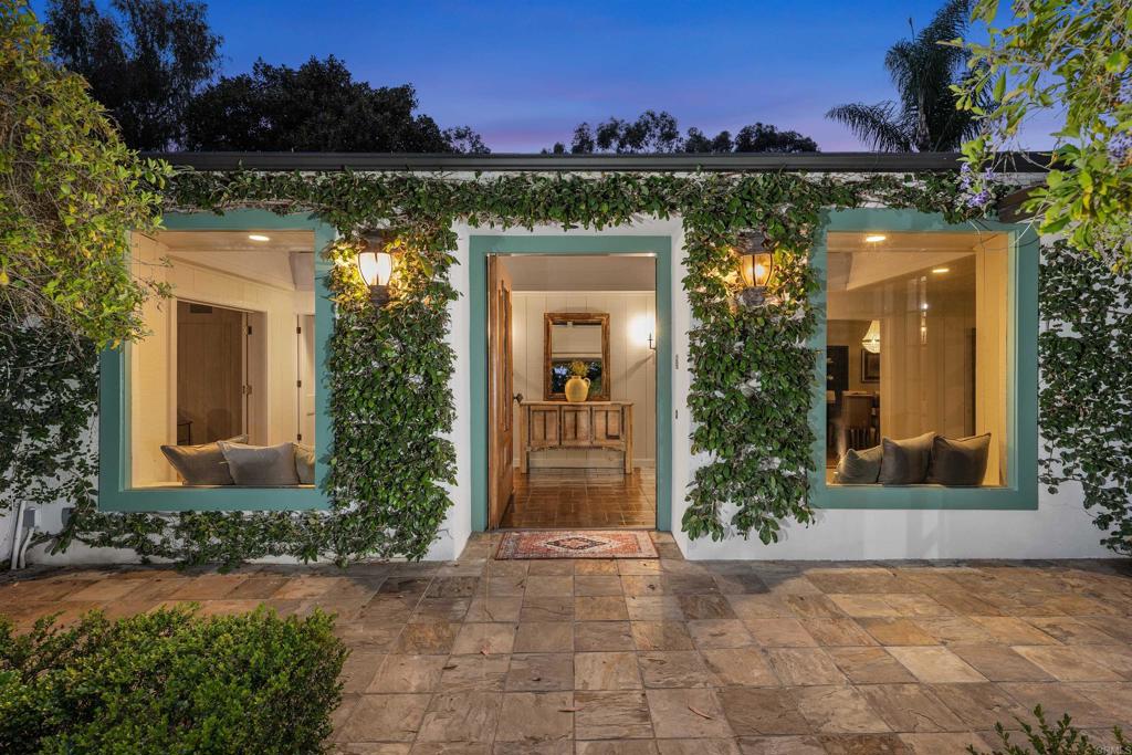 Welcome to Serenity Ranch. This stunning sun-drenched single story+ studio cottage on nearly two lushly landscaped acres is on one of the most prestigious and sought-after streets in the covenant. The home boasts 6 bedrooms and 3.5 baths in the main house with nearly 7000 square feet of living space, including three family room areas, an office, gym and a professional dance studio. The home has a unique layout with multiple distinct spaces and a flexible floor plan. The studio cottage + full bathroom is perfect for guests or multi-generational living! The new buyer benefits from a very low electric bill with 50 solar panels on the new roof, which was replaced last year at a cost of $125,000. The backyard is your own personal sanctuary with a pool, spa, tennis court (with lines painted for pickleball) and plenty of land for new development. The landscaping is meticulously cared for with fruit trees and a variety mature trees, plants and greenery virtually everywhere you look. Don't miss this rare opportunity to call this special property your home!