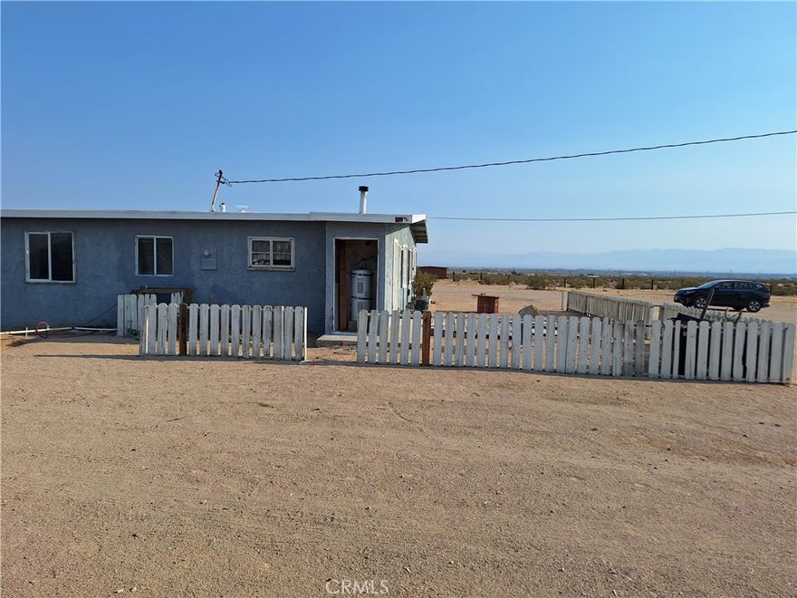 Cozy 3-Bedroom, 2-Bath Home on Nearly 5 Acres with Sweeping Views of Ridgecrest. Escape to peaceful desert living with this charming 3-bedroom, 2-bathroom home situated on nearly five fully fenced acres. Enjoy stunning panoramic views of Ridgecrest and the surrounding California desert right from your doorstep. This great-sized, cozy home offers the best of both worlds—the tranquility of living just outside of town, while still being minutes from shopping, dining, and all your favorite local spots. Perfect for equestrian lovers and off-road enthusiasts, the open desert is literally your backyard!

With plenty of space for RVs, recreational toys, or building out your dream setup, this property has incredible potential. Some cosmetic repairs are needed, allowing you to add your personal touch and make it your own. Note: No FHA offers will be considered.