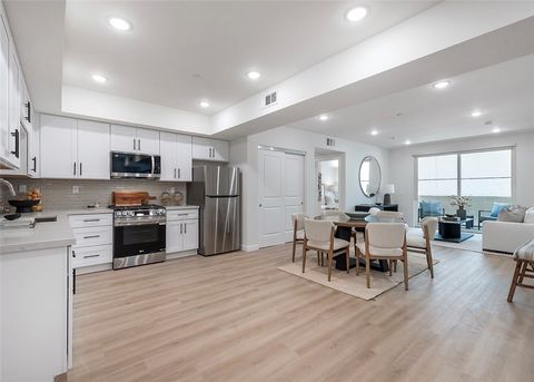 Photo of 1303 S Orange Grove Avenue #601, Los Angeles, CA 90019 (MLS # SB26082958)