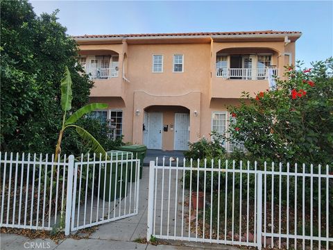 Photo of 1079 Leighton Ave, Los Angeles, CA 90037 (MLS # DW25230355)