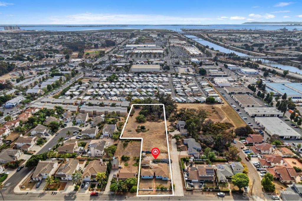 Presenting a truly rare and exceptional opportunity in northwest Chula Vista for developers, investors, or those dreaming of a private estate with immense future potential. This offering features a single-family residence situated on a sprawling 2.06-acre lot with water views, which was the subject of a previously approved, but uncompleted, 10-lot subdivision known as "Villas Del Mar". The existing 4 Bed, 3 Bath home provides immediate comfort and privacy, surrounded by vast open space. Live in or rent out the current residence while you finalize your vision for the remaining land. The expansive acreage offers a sense of seclusion that is nearly impossible to find in San Diego County. Unlock significant potential upside value with the extensive entitlements already in place. The City of Chula Vista previously approved Tentative Map Tract 04-06 to subdivide the 2.06 acres into 10 single-family residential lots. The property's General Plan designation is Residential Low Medium (3-6 dwelling units per acre), and it is located in the Residential Single Family (R-1-P6) zone, potentially supporting a multi-home development. This is a unique chance to acquire a substantial landholding with a clear potential development path laid out. Capitalize on the work already done, or create your own vision, and bring this opportunity of an exclusive Chula Vista enclave to life.