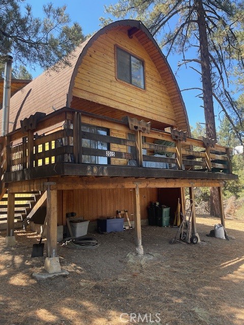 Welcome home! This uniquely shaped 2 story home has a large lot for plenty of parking, big bedrooms, a comfortable open kitchen and dining area and great views! All wood, with a upside boat u shape, you have to see it to appreciate the craftsmanship that went into this home. Located in beautiful Pine Mountain Club, just a short drive away from Santa Clarita, Bakersfield and the new Hard Rock Café and Casino that should be open in December! Pine Mountain offers gorgeous 4 seasons with mild weather in the Summer and Spring and plenty of snow in the Winter months. The HOA provides year round activities for all ages, heated pool, jacuzzi, pickleball, tennis, golf, restaurants, 24 hour patrol, road maintenance and so much more! Please visit the web page at Pinemountainclub.com to see what we have to offer! I can't wait to meet you and show you this great house!