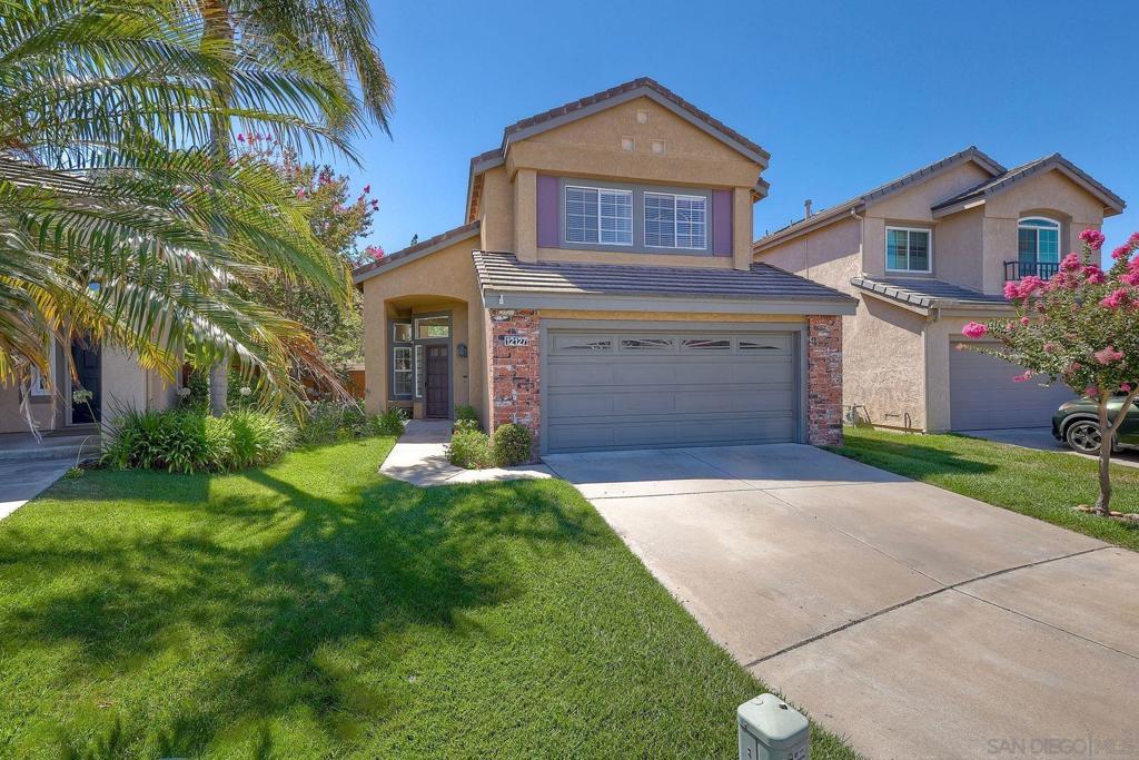 Welcome to 12127 Corte Napoli, a 3-bedroom, 2.5-bath home tucked away on a quiet, flat cul-de-sac in the highly desirable neighborhood of Villagio in Carmel Mountain Ranch. With over 1,700 sq. ft., soaring ceilings, and large windows, this home is filled with natural light and an airy, open feel. The living room features a cozy fireplace with defined spaces for dining and relaxing, while the efficient kitchen makes daily meals simple and stress-free. Upstairs, the primary suite offers vaulted ceilings, his-and-her closets, and a remodeled spa-like bathroom with dual vanities, modern finishes, and a zero-clearance entry shower. Two additional bedrooms are generously sized and share a convenient bath. Outside, enjoy a private, low-maintenance backyard ideal for pets, gardening, or dining, plus beautifully landscaped curb appeal in the front. Families will love being walking distance to Highland Ranch Elementary School in the award-winning Poway Unified School District. Nearby parks, trails, and open spaces make outdoor living easy, and with Trader Joe’s, Costco, shopping at the Carmel Mountain Plaza, and dining just 2 minutes away, convenience is built in. Quick freeway access to I-15 and SR-56 connects you to major job centers and all of San Diego Welcome to 12127 Corte Napoli, a 3-bedroom, 2.5-bath home tucked away on a quiet, flat cul-de-sac in the highly desirable neighborhood of Villagio in Carmel Mountain Ranch. With over 1,700 sq. ft., soaring ceilings, and large windows, this home is filled with natural light and an airy, open feel. The living room features a cozy fireplace with defined spaces for dining and relaxing, while the efficient kitchen makes daily meals simple and stress-free. Upstairs, the primary suite offers vaulted ceilings, his-and-her closets, and a remodeled spa-like bathroom with dual vanities, modern finishes, and a zero-clearance entry shower. Two additional bedrooms are generously sized and share a convenient bath. Outside, enjoy a private, low-maintenance backyard ideal for pets, gardening, or dining, plus beautifully landscaped curb appeal in the front. Families will love being walking distance to Highland Ranch Elementary School in the award-winning Poway Unified School District. Nearby parks, trails, and open spaces make outdoor living easy, and with Trader Joe’s, Costco, shopping at the Carmel Mountain Plaza, and dining just 2 minutes away, convenience is built in. Quick freeway access to I-15 and SR-56 connects you to major job centers and all of San Diego