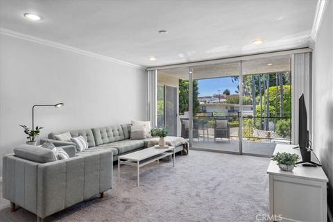 Photo of 289 S Barrington Avenue #A203, Los Angeles, CA 90049 (MLS # SB26064233)