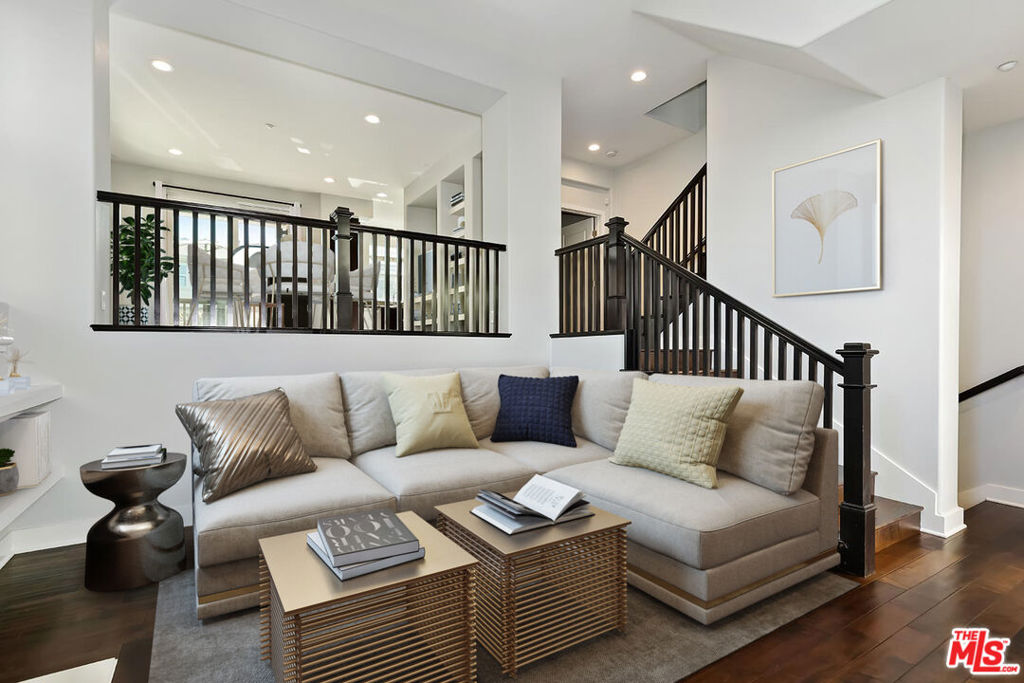 Spacious townhome for lease in Playa Vista, available mid-July. Don't miss this bright and airy 3-story townhome in the highly sought-after Tapestry II community of Playa Vista. Offering approximately 1,510 square feet of thoughtfully designed living space, this home features a formal living room, family room, and dining area, along with a cozy gas fireplace and private outdoor balcony. The residence boasts soaring ceilings and oversized windows that flood the home with natural light. Rich cherry hardwood floors grace the main living areas, while the bedrooms offer plush carpeting for added comfort. The upgraded kitchen includes stainless steel appliances and ample cabinet space, making it both stylish and functional. Additional highlights include a private 2-car garage with EV charger, extra storage space, and a quiet, interior-facing location. Rent includes water, trash, and security monitoring services, as well as access to The Resort's pool and fitness center just two blocks away. Located in Playa Vista's walkable Phase I neighborhood, you're just a short stroll from Whole Foods, the movie theater, top-rated restaurants, Concert Park Shoppes, and more. Enjoy 29 beautifully maintained parks and 24/7 neighborhood security with bike patrol for added peace of mind.