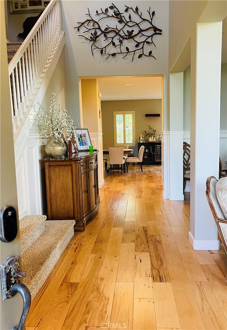 BEAUTIFUL, newly remodeled SFR in the Copperhill North area of Saugus near the end of a tree lined cul de sac. This home has 4BD/2.5BA on a large lot with spacious backyard. It boasts hardwood floors throughout first floor, wainscoting in the formal living and dining room areas, HUGE open family room and kitchen with tons of natural light through windows that overlook the luscious backyard. The second floor has 4 ample sized bedrooms, 2 full baths, mirrored closets, office space, large linen cabinet and hardwood/carpet throughout. The backyard has a concrete deck and lots of space for entertaining. The property is close to schools and shopping areas/mall.