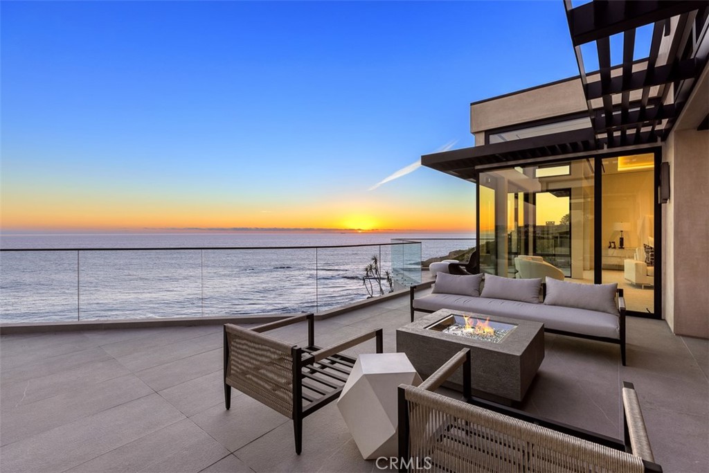 Submitted for comp purposes only. Spectacular newly built, oceanfront contemporary home situated on one of the premier Monarch Bay lots. Panoramic ocean and golf course views including Catalina Island, Ritz Carlton, Dana Point headlands and beyond. Monarch Bay has its own private Beach Club on the sand managed by the five star Waldorf-Astoria.