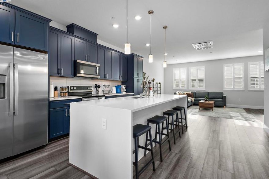 Compass Plan 7 at Bay37. A stunning 1,997 square foot townhouse-style condo bathed in modern upgrades (including OWNED solar system!) Boasting 3 bedrooms, 2.5 bathrooms, and a versatile flex room, it caters to every lifestyle. And wait, there's more! Spa-Worthy Master Bath: Indulge in a master retreat unlike any other. Heated Toilet Seats: Because luxury shouldn't stop at the doorway. Flex Room: This bonus space is your blank canvas! Craft your dream home office, art studio, or the ultimate relaxation zone. Side-by-side 2-car garage. A waterfall-edge kitchen island: Fit for a culinary king or queen, this island is the perfect spot to whip up masterpieces. Extensive Upgrades Throughout: Forget builder-grade beige! This condo is decked out with all the latest and greatest. From top-of-the-line finishes to designer touches, every detail is meticulously crafted. Location, Location, Location! This gem sits nestled in a vibrant community, offering - Easy access to Everything: Live close to the action without sacrificing peace and quiet. Walking distance to waterfront Bohol Circle Immigrant Park and Alameda Landing Shopping: Enjoy the convenience of having everything you need right at your fingertips. Ditch the ordinary and embrace an unparalleled living experience!