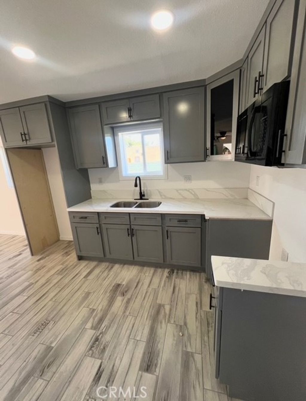 Photo of 1413 E 91st St, Los Angeles, CA 90002 (MLS # DW26038028)