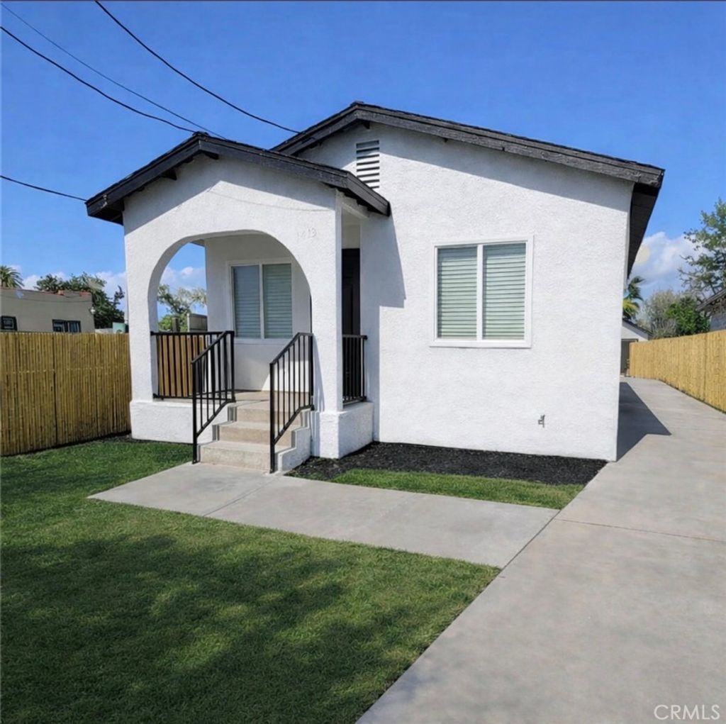 Photo of 1413 E 91st St, Los Angeles, CA 90002 (MLS # DW26038028)