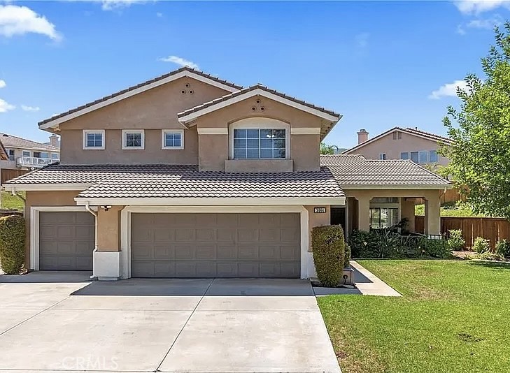Welcome to your dream home ! This remarkable 5-bedroom, 3-bathroom residence spans an impressive 2,469 square feet, all set on a spacious 10,454 square foot lot in the highly sought-after South Corona neighborhood.
As you approach, the charming curb appeal draws you in, hinting at the thoughtful upgrades that await inside. Step through the front door and be greeted by an airy open floor plan adorned with soaring ceilings and recessed lighting, creating a warm and inviting atmosphere perfect for both relaxation and entertaining.
The formal living and dining areas are bright and spacious, ideal for hosting gatherings with family and friends. At the heart of the home lies a stunning kitchen, featuring sleek stainless steel appliances, a generous center island, and ample cabinet space, all seamlessly flowing into the cozy family room. Here, a gas fireplace and ceiling fan create a welcoming ambiance, while sliding doors open to your private backyard oasis.
The main floor also boasts a well-sized bedroom and a full bath, perfect for guests or multigenerational living, alongside a convenient laundry room for added practicality.
Venture upstairs to discover four additional bedrooms and a versatile bonus area, ideal for a home office, playroom, or media center. The luxurious primary suite impresses with vaulted ceilings, a spa-like en-suite bathroom, and a walk-in closet outfitted with a custom organization system.
Step outside to find an entertainer's paradise in the expansive backyard, featuring a spacious patio perfect for barbecues, relaxing evenings, and outdoor fun. The 3-car garage offers plenty of space for vehicles, storage, or even a home gym.
Situated near top-rated schools, shopping centers, hospitals, and scenic hiking trails, with easy access to freeways, this home perfectly blends comfort, style, and convenience. Don’t let this opportunity slip away!