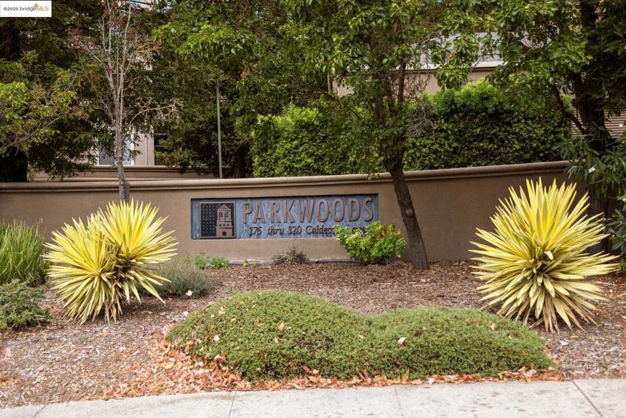 Parkwoods Community is a quiet and secluded complex just off Tunnel Road a few minutes drive to the Rockridge, Elmwood and Montclair shopping districts, as well as UC Berkeley and BART. This gated community has wonderful amenities, such as a pool, spa, sauna, fitness center, and clubhouse. Unit 208 is a sunny retreat with forest views and two private balconies.  The living and dining room is graced by a fireplace and flows into the kitchen that has ample storage and new refrigerator. The residence includes two bedrooms and two bathrooms. The primary suite has a separate large walk-in closet and the unit also includes a new washer/dryer.  There are two dedicated interior parking spaces in the garage. There is ample guest parking nearby.