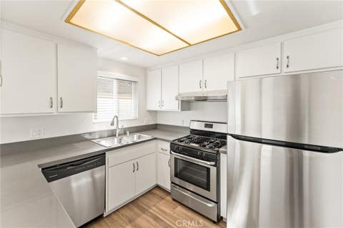 Photo of 17972 Baron Circle Cir #4, Huntington Beach, CA 92647 (MLS # PW26148924)
