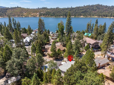 Photo of 53746 Acorn Rd, Bass Lake, CA 93604 (MLS # FR26186772)