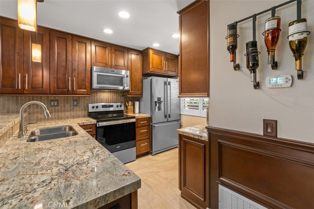 Photo of 26 Lakepines, Irvine, CA 92620 (MLS # OC26009341)