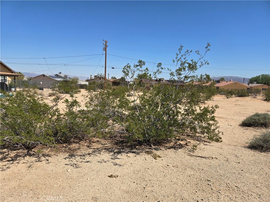 Build your dream in the heart of the high desert with this .2-acre residential lot in Twentynine Palms. Located just minutes from downtown and a short drive to the entrance of Joshua Tree National Park, this property offers both convenience and adventure. With utilities close by and easy access to local amenities, it's a rare opportunity to create a home or retreat surrounded by natural beauty and desert skies.