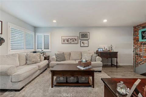 Photo of 16406 Vista Roma Cir # 115, Huntington Beach, CA 92649 (MLS # SW26045891)