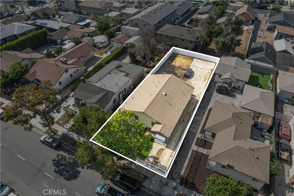 Welcome to 1220 W 92nd Street, a spacious and versatile duplex located just minutes from SoFi Stadium, the Kia Forum, and the new Intuit Dome. This income-producing property features two well-maintained units, each offering 2 bedrooms and 1 bathroom, for a total of 4 bedrooms across the property. Sitting on a large 6,750 square foot lot, the home offers abundant off-street parking and is zoned LCR320U*, a Los Angeles County multi-family designation that allows up to three units by right based on the lot size (one unit per 2,000 square feet). There is also potential to add an accessory dwelling unit (ADU) or junior ADU under California’s housing laws, providing additional flexibility for development or rental income. One unit is currently rented, generating immediate cash flow, while the other is vacant and ready for occupancy, renovation, or to be leased—making this a perfect fit for both investors and owner-occupants. Live in one and rent the other, or lease both to take advantage of the strong rental demand in this fast-growing South LA neighborhood. With close proximity to major venues, freeways, shopping, and public transportation, this property offers both immediate returns and long-term appreciation potential. Whether you're looking to start or grow your portfolio, secure a multi-generational living solution, or invest in an area with consistent development and high rental demand, 1220 W 92nd Street offers the space, zoning, and flexibility to meet your goals.