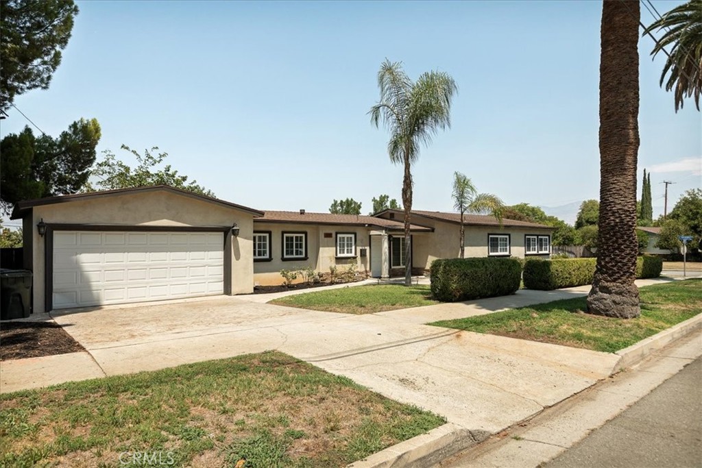 Welcome to this beautifully upgraded single story home located in the highly sought after South Redlands area. Featuring 3 spacious bedrooms and 3 full bathrooms, this bright and open floor plan is filled with natural light and offers a warm, inviting atmosphere. Enjoy modern vinyl flooring throughout, complemented by neutral interior paint that suits any style. The kitchen comes fully equipped with stainless steel appliances, all included, and opens to an oversized dining area or optional family room perfect for flexible living. The master suite is generously sized with built in closets, abundant windows, and an en suite bathroom for your comfort. Additional highlights include an indoor laundry room with washer and dryer included, and a spacious backyard complete with a covered patio, fruit trees, and ample room for entertaining. Situated close to hospitals, schools, and shopping centers, this home offers both convenience and charm. Schedule your private tour today!