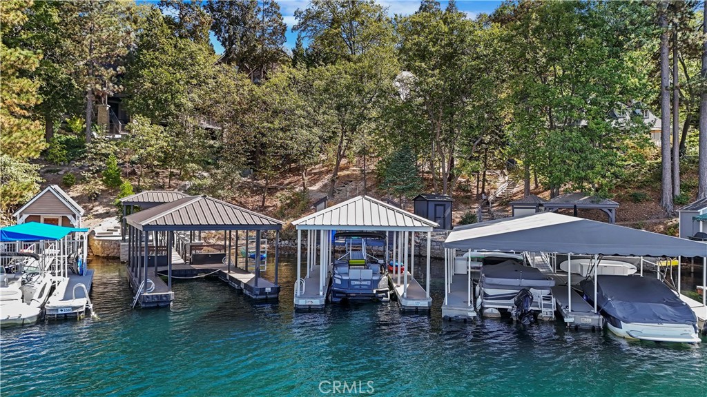 SINGLE SLIP! Dock with two Dock Houses perfect for storage & entertaining. Provides extra privacy. Location in the calm deep waters of Emerald Bay with beautiful days and evening sunsets. ALA access#3 provides direct access to the dock. Parking & easy access.
Public Remarks: SINGLE SLIP! Dock with two Dock Houses perfect for storage & entertaining. Provides extra privacy. Location in the calm deep waters of Emerald Bay with beautiful days and evening sunsets. ALA access#3 provides direct access to the dock. Parking & easy access.