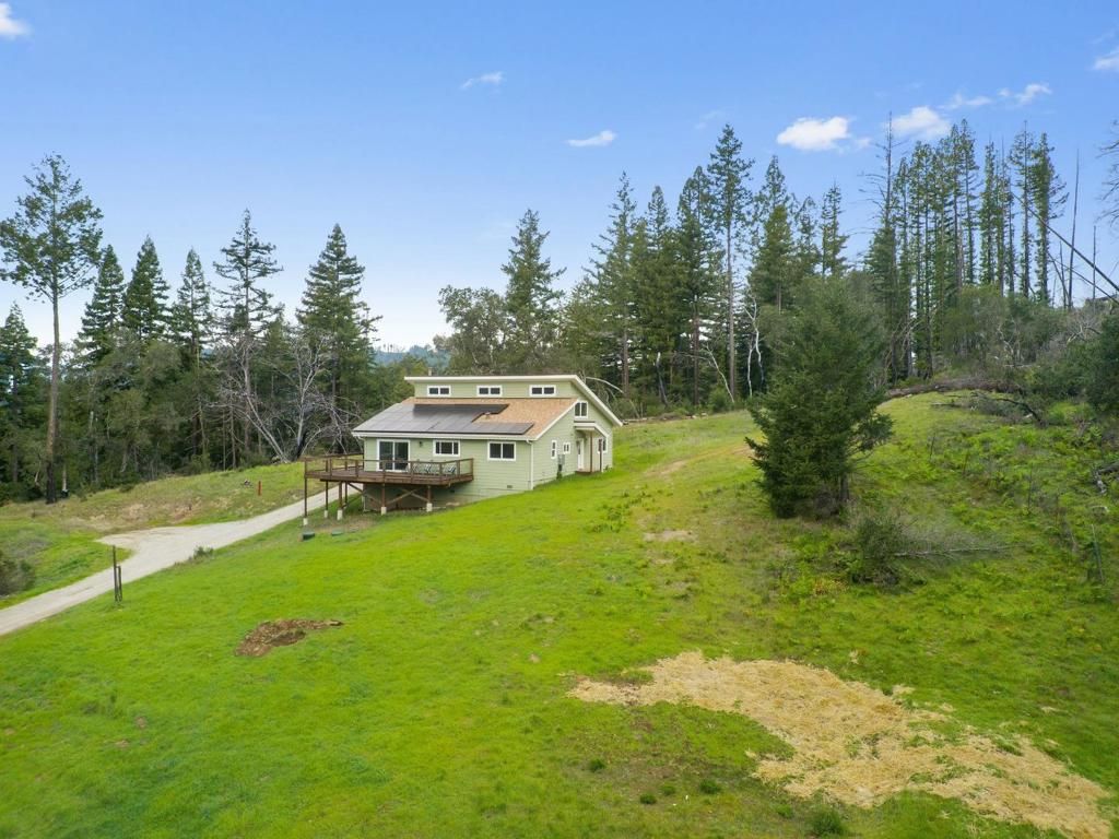 Photo of 411 Midway Ranch Road, Boulder Creek, CA 95006 (MLS # ML82035360)