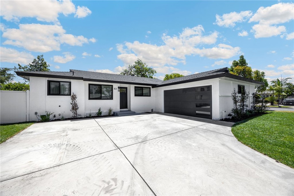 Stunning, Fully Remodeled Home in Prime Santa Ana Neighborhood! Welcome to this beautifully renovated 3-bedroom, 2-bathroom home, ideally situated on a quiet, well-kept street in one of Santa Ana’s most desirable neighborhoods. From the moment you arrive, you’ll be captivated by the thoughtful updates, modern finishes, and inviting curb appeal. Step inside to discover a bright and open floor plan featuring a chef-inspired kitchen bathed in natural light. The space boasts sleek oak-tone shaker cabinets, elegant quartz countertops, a generous breakfast bar, and brand-new stainless steel appliances—perfect for both everyday living and entertaining. Both bathrooms have been tastefully redesigned with contemporary fixtures and finishes. Each bedroom offers ample space and large closets, with the primary suite including a private ensuite bath for added comfort. Additional upgrades include: Brand new waterproof luxury vinyl plank flooring throughout, energy-efficient dual-pane windows, stylish new lighting and ceiling fans, new 200 AMP electrical panel, central air and heat system with all-new ductwork, brand new roof with a 10-year warranty, new water heater, and a freshly drywalled attached 2-car garage. The front and backyard have been professionally landscaped with fresh sod, mulch, and plants, complemented by an automatic sprinkler system—ready for summer fun or weekend relaxation. Perfectly located near great schools, shopping, dining, public transportation, and major freeways, this home offers both comfort and convenience. This is a must-see property with upgrades galore—come take a look before its gone!