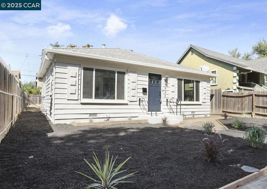 Step into this beautifully renovated 2-bedroom, 1-bathroom home that blends style, comfort, and functionality. From the moment you arrive, the curb appeal and spacious front yard set the tone for what’s inside. Inside, you'll find a stunning open-concept living and kitchen area—perfect for entertaining or relaxing in style. The upgraded fixtures and sleek laminate flooring throughout create a cohesive, modern vibe. The kitchen shines with contemporary finishes and flows effortlessly into the living space, making hosting a breeze. Outside, enjoy a generous backyard ideal for weekend gatherings, gardening projects, or simply soaking up the sun. Whether you're a green thumb or a grill master, this outdoor space is ready for you. The oversized laundry room offers flexibility—use it as a craft room or extra storage space, It’s a bonus area that adapts to your lifestyle. This home is move-in ready and waiting for someone to love it as much as it’s been cared for. Don’t miss your chance to own this gem!