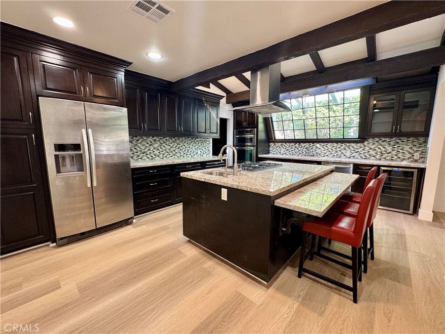 Welcome to your beautifully reimagined dream home at 19024 Miranda St, Tarzana, CA 91356. After a brief hiatus, this spacious 3-bedroom, 2-bathroom residence—with an additional den or home office—has returned to the market fully remodeled and better than ever. The home sits on a quiet, tree-lined cul-de-sac in one of Tarzana’s most desirable pockets, offering both privacy and convenience. Just minutes from Ventura Boulevard, the location provides easy access to highly rated schools, lush parks, boutique shops, and a wide range of dining and entertainment options. Nearly 2,000 square feet of living space welcomes you with brand new flooring, fresh designer-inspired landscaping, and abundant natural light throughout. The layout includes a large living and family room, formal dining area, and a separate indoor laundry room with extra storage. Each bedroom is generously sized with ample closet space, and the primary suite features a custom walk-in closet system and a remodeled bathroom with dual vanities. Whether you're looking to entertain or unwind, the spacious backyard offers a perfect setting. This home combines modern updates with timeless comfort—ready for you to move in and enjoy. CALL ANTHONY TODAY | (818) 620-1637 | THIS HOME WILL NOT LAST