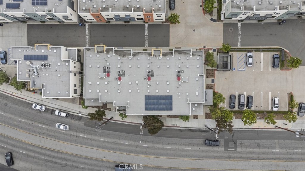 Now available in the heart of Bellflower—this sleek and modern commercial office suite offers approximately 900 square feet of functional, high-visibility space ideal for a wide range of professional or creative uses. Positioned on the ground level for easy access and daily exposure, the unit features floor-to-ceiling windows, polished interiors, and a well-designed layout that includes multiple enclosed offices, a conference area, and open workspace potential. Thoughtfully built out with glass partitions, contemporary flooring, high ceilings, and recessed lighting throughout, the space provides a turnkey environment for owner-users or investors alike. Situated in a well-maintained mixed-use complex with street frontage and signage visibility. Minutes from major corridors, freeways, and surrounding retail amenities. A must-see for those looking to establish or expand in a prime Bellflower location.
