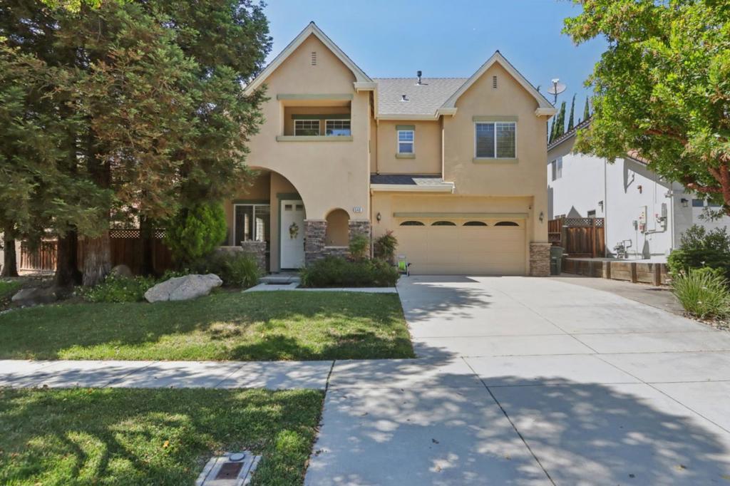 Welcome to this spacious 4-bedroom, 2-bathroom home located in the charming city of Hollister. With a generous living space of 2,213 sq ft, this residence offers an ideal blend of comfort and functionality. The kitchen is a central hub, perfect for culinary enthusiasts, and seamlessly connects with the dining area for easy entertaining. Enjoy the warmth and ambiance provided by the fireplace, perfect for cozy evenings. Central AC and heating ensure year-round comfort, while the separate family room offers additional space for relaxation or gatherings. Practical amenities include a dedicated laundry area and a two-car garage. The home is situated on a substantial lot of 7,305 sq ft, providing ample outdoor space for activities or gardening. This property falls within the Hollister Elementary School District, ensuring educational options close to home. Experience comfortable living in Hollister, where convenience meets charm.