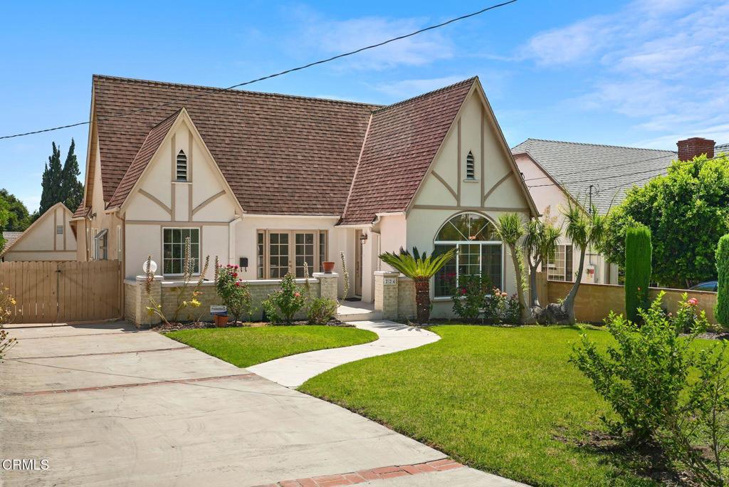 Charming Tudor-Style Retreat with All Utilities Included -- Even Basic Cable!Welcome to 224 West Terrace Street, Altadena -- a beautifully updated Tudor-style home that perfectly combines timeless charm with modern comfort. With all utilities included, including basic cable, living here is as easy as it is delightful.From the moment you arrive, the home's storybook curb appeal sets the tone -- a curved walkway, manicured landscaping, and distinctive rooflines lead to a welcoming courtyard and elegant arched windows.Step inside to freshly painted interiors, hardwood-style flooring, and classic coved ceilings that enhance the bright and airy atmosphere. The spacious living room features a decorative fireplace, graceful arched transitions, and brand-new window treatments that highlight the home's vintage elegance.The kitchen blends traditional charm with modern upgrades--boasting new counters and flooring, and original wood cabinetry. The adjacent dining room glows beneath a crystal chandelier and opens through French doors to a cozy front patio--ideal for morning coffee or evening relaxation.The bathroom has been tastefully modernized with dual sinks, updated fixtures, and clean tile finishes. A dedicated laundry room includes a washer, dryer, and generous storage.Out back, enjoy a private garden retreat with mature citrus trees and lush landscaping--a serene setting for entertaining or unwinding.Please note that there is a small owner's apartment attached to the main house. The owner rarely visits--typically just once a year, if at all--ensuring you can enjoy the home uninterrupted most of the time. The garage is reserved for the owner's use, but you'll have plenty of driveway parking, including gated spaces for added convenience.
