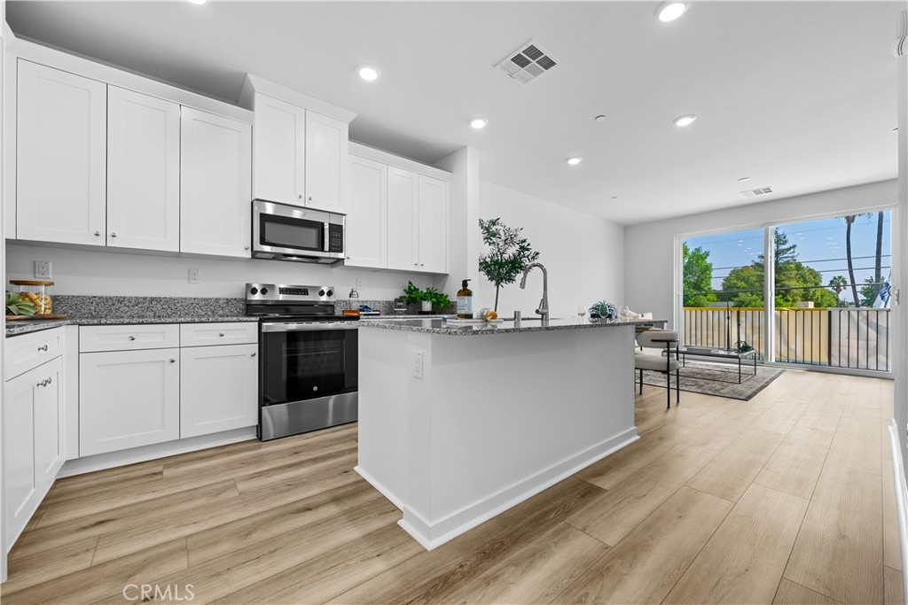 Brand New Homes!
Nestled in the heart of North Hills, this private gated community boasts 58 trilevel condominiums.
Our prime location offers unparalleled convenience, with easy access to everything you need. Just minutes from the 405 freeway, you can commute to work or play with unmatched speed and ease.
Step inside this modern home and be greeted by a spacious covered entryway. The second-floor features nine-foot ceilings, and a balcony off the family room, flooding the space with natural light and creating a perfect ambiance for relaxation and entertainment.
On the third level, you’ll find the primary bedroom, a secondary bedroom with an in-suite bath, and a laundry room. This home has it all, making it an ideal choice for buyers seeking a comfortable and spacious living environment.
"Photos are for illustrative purposes only and may not represent the actual unit/home. Actual finishes and features may vary."
