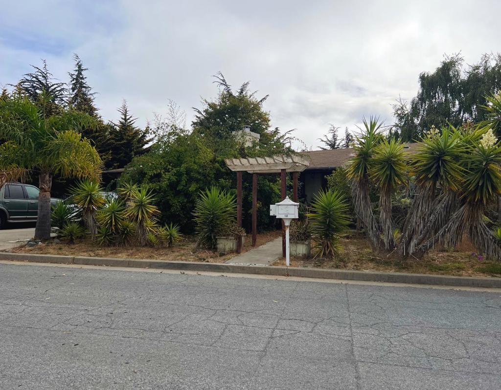 Welcome to one of Watsonville's most sought-after neighborhoods! This charming ranch-style home is nearby Kelly Lake and St. Francis Private High School. Tucked at the end of a peaceful cul-de-sac, this spacious 4-bedroom, 3-bathroom home offers a perfect balance of comfort and convenience. The unique layout features two primary bedrooms, providing plenty of space for family or guests. The kitchen showcases oak cabinets with a light wood finish and a classic white tile backsplash, creating a warm and inviting atmosphere. Partial hardwood floors flow throughout, perfectly coordinating with the kitchen's natural design. The living room features a cozy fireplace, ideal for gathering during cooler evenings. Outside, the expansive backyard is a private oasis, perfect for entertaining or relaxation. With a generous 7,928 sq. ft. lot, you have ample room to create your dream outdoor space. The attached 2-car garage provides plenty of storage for vehicles and outdoor equipment. This home is about 15 minutes away from the beach and approximately 25 minutes from the Santa Cruz Beach Boardwalk. It also offers easy access to Highway 1, 101, and 129.