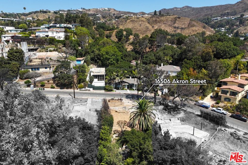 Set in the sought-after Marquez Knolls, this property offers an ideal opportunity to build a stunning canyon retreat. The previous 2,538-SF two-story residence enjoyed treetop views into the canyon below. A lower structure, once used as a music studio, survived the fire and offers the perfect footprint for an office, gym, or creative space. Just moments from Palisades Village, this special lot is ready for its next chapter. Phase 1 EPA remediation and Phase 2 debris removal by the Army Corps of Engineers have been completed. Located within Tract 9300.