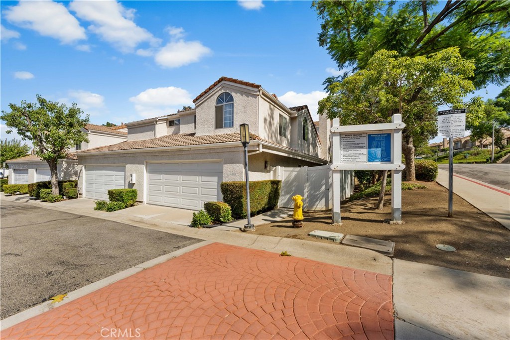 Welcome to the prime location of Chino Hills! This beautiful end unit is a 3-bedroom, 3-bathroom townhome-style condo that offers the perfect blend of comfort, convenience, and low-maintenance living. Step inside to high vaulted ceiling, abundant natural light, and an open-concept layout perfect for everyday living. The spacious living room features a cozy fireplace and direct access to your private patio—ideal for morning coffee or weekend BBQs. The modern kitchen boasts quartz countertops, stainless steel appliances, and ample cabinetry. Adjacent to the dining area, a full bathroom and a bedroom on the main level offer flexibility for guests, a home office, or multi-generational living. Upstairs, you’ll find two generously sized ensuite bedrooms. The primary suite includes a beautifully upgraded bathroom with dual sinks and a large soaking tub.
Conveniently located near Costco, 99 Ranch Market, The Shoppes at Chino Hills, top-rated schools, and with easy access to the 60 & 71 freeway. This area is under major expansion with lots of new restaurants, and big chain T&T Supermarket expecting to open Fall 2026. Whether you're a first-time buyer, downsizing, or investing, this turnkey home offers comfort, style, and a premium location in the heart of Chino Hills.