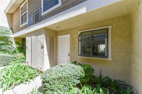 Photo of 63 Lakepines, Irvine, CA 92620 (MLS # OC26127796)