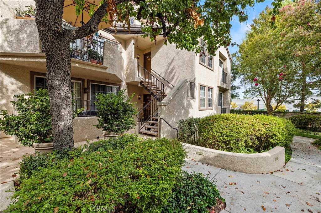 Welcome to this inviting, just renovated condo in the desirable Siena Villas community of Valencia.
This sunny unit has just been updated with new kitchen counters, a new farmhouse kitchen sink, new paint and carpets. This end unit offering is Siena Villas' largest model and is privately located on the second floor at the back of its building. It features a loft with additional storage and a cozy fireplace. You're sure to appreciate the gated two car side by side parking spaces assigned to this unit.
This HOA features 3 pools, a tennis court, picnic area and covers trash and water.
Very conveniently located, Siena Villas sits across from Summit Park and close by Whole Foods, Kohl's, the Valencia Town Center and various restaurant offerings.