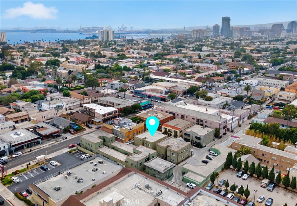 412 Rose Place is a well-maintained 4-unit apartment property located in the heart of Long Beach’s iconic 4th Street / Retro Row district.
The property offers (2) 2 BD/1.75 BA with a den floorplans and (2) 2 BD/1 BA with den floorplans as well as a common rear patio
for tenants to enjoy. A separate laundry room provides potential extra income. Additionally there is an opportunity to acquire an adjacent parking lot in a neighborhood where parking is often limited, which has 15 Storage spaces and 8 parking spaces. Seller is asking $500K.
The property has undergone recent improvements, including new windows installed throughout within the past five years, new exterior stucco, and a precast rear stairway.
Recognized in publications such as The New York Times, Sunset Magazine, and The New Yorker, 4th Street / Retro Row is a vibrant, pedestrian- and bike-friendly corridor, home to 40+ independent merchants. The area is celebrated for its eclectic mix of vintage and contemporary clothing, furniture, accessories, art, antiques, and collectibles, as well as a diverse range of acclaimed restaurants, cafés, wine bars.
With its prime location, strong rental fundamentals, and recent upgrades, 412 Rose Place represents a compelling investment opportunity for buyers seeking stable income and long-term value in one of the city’s most dynamic submarkets.