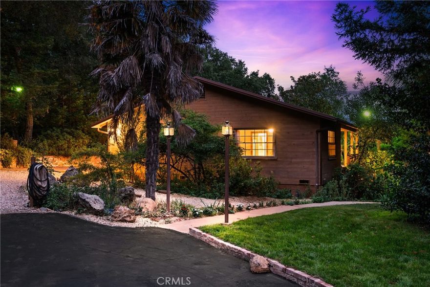 Introducing “The Toro Creek Retreat” — nestled along the scenic west side of Atascadero, this property offers the perfect blend of privacy, charm, and country living. Set on 3.59 picturesque acres, this gated property features a single-level 2-bedroom, 2-bathroom home and two spacious shops, providing endless possibilities for hobbies, storage, or creative pursuits.



Inside, the home exudes warmth and ease of living, with wide hallways, an inviting layout, and a charming wood-burning fireplace that adds to the cozy ambiance. Every window offers 360-degree views of trees, lush plants, and serene natural scenery, creating a true sense of tranquility.



Outdoors, the property truly shines. Two covered porches provide peaceful spots to take in the surrounding beauty, while a greenhouse, storage shed, and two shops offer plenty of space for gardening, projects, or equipment. A peaceful pond enhances the idyllic landscape, and the property’s unique microclimate nurtures fruit trees, vegetables, and vibrant landscaping year-round.



Ideally situated just off Highway 41, you’ll find yourself halfway between Morro Bay and downtown Atascadero, with easy access to the coast, shopping, and local amenities. Just down the road, the popular Halfway Station offers live music and great food, adding to the inviting local charm.



“The Toro Creek Retreat” beautifully blends rural tranquility with the relaxed spirit of the Central Coast.