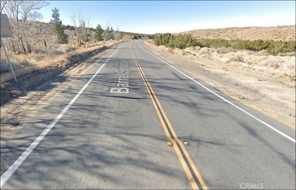 28.8 Acres Commercial Zoning, Easy acces to 14 freeway , Barrel Springs Ave runs in the middle of the both parcels making it very desirable for commercial use. Two parcels Included portfolio sale 3048029003 and 3048029008.