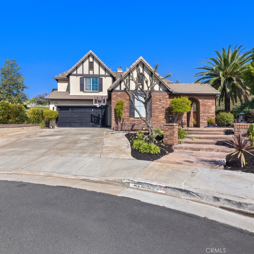 Tucked at the end of a quiet cul-de-sac in a beautiful neighborhood, this private 2-story home with 3,903 sqft, blends generous living spaces with resort-style outdoor amenities on a large lot just over a quarter acre. Step inside to bright open living areas with large windows that invite plenty of natural light into the home The kitchen features double ovens a built in range and an island that opens to the family room. Work in style from the main-level office with high-quality wood floors and built-in shelving. A convenient downstairs bedroom and 1.5 baths offer flexible guest or multigenerational living. The living room flows seamlessly into the backyard with the double doors to enjoy indoor/outdoor space.
Upstairs, you have your own private gym room and all bedrooms have direct access to a bathroom. The spacious primary suite boasts hillside views, two walk-in closets (one with built-in organizers) and a vanity area, plus a travertine-finished bath with separate shower, tub and dual sinks. Outside is your private oasis—no rear neighbor—complete with pool & spa, waterfall and slide, outdoor shower, Outdoor built-in BBQ kitchen area with granite counters , and an outdoor fireplace for year-round gatherings. A 4-car garage and bug driveway you will have plenty of space for your cars or toys. Fresh interior paint, close to an award-winning elementary school & Vista Murrieta High School, 215/15 freeways and everyday amenities—this home is the total package.
Highlights
5 bed | 5 bath + office & loft | ~3,903 sq ft
Large lot (just over ¼ acre) on a cul-de-sac; no back neighbor; hill views
4-car garage + large driveway
Kitchen island open to family room; double ovens & built-in range
Family room fireplace; double doors to backyard
Main-level office w/ wood floors & built-ins
Downstairs bedroom & bath
Upstairs gym
Primary suite: 2 walk-in closets (one organized), vanity area, travertine bath w/ separate shower & tub, dual vanities
Backyard: pool & spa, waterfall & slide, outdoor shower, built-in BBQ, outdoor fireplace
Freshly painted interior; close to award-winning elementary school, freeways & amenities