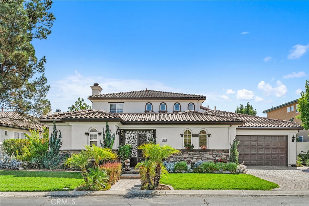 Location, Location, Location! Welcome to refined living on the 11t fairway of the exclusive Bear Creek Golf Course community, just minutes from the heart of Temecula Wine Country. This stunning 4-bedroom including a private detached casita, offers a perfect blend of luxury, comfort, and resort-style amenities in one of Murrieta's most desirable communities. Inside, you'll find a thoughtfully designed floor plan that includes a main-floor master bedroom with fireplace, large bath with spa tub, separate walk-in shower, double sinks, vanity and double entry walk-in closet. In addition, on the main floor is a dedicated home office, and a fully equipped private casita--ideal as a fourth bedroom, guest suite, or private retreat. The home features a temperature-controlled wine cellar, a spa-style jacuzzi, and expansive living spaces that flow effortlessly for indoor-outdoor entertainment. The main living area showcases high-end finishes, soaring ceilings, and natural light, all set against a beautiful lake just a few feet from the back yard and a backdrop of stunning mountain views and picturesque sunsets over the fairway. Upstairs, two guest bedrooms each enjoy private en-suite bathrooms, offering privacy and comfort for family or visitors and a spacious game room/loft with built-ins and picture windows. As a resident of the prestigious Bear Creek community, you’ll enjoy access to exclusive amenities including a resort-style pool, tennis, pickleball, bocce ball and basketball courts, a state-of-the-art fitness center—all within a secure and beautifully maintained environment. Whether you're entertaining under the stars, working from your private home office, or simply soaking in the serene views, this home offers a rare opportunity to live the luxury lifestyle near Temecula’s world-class vineyards.