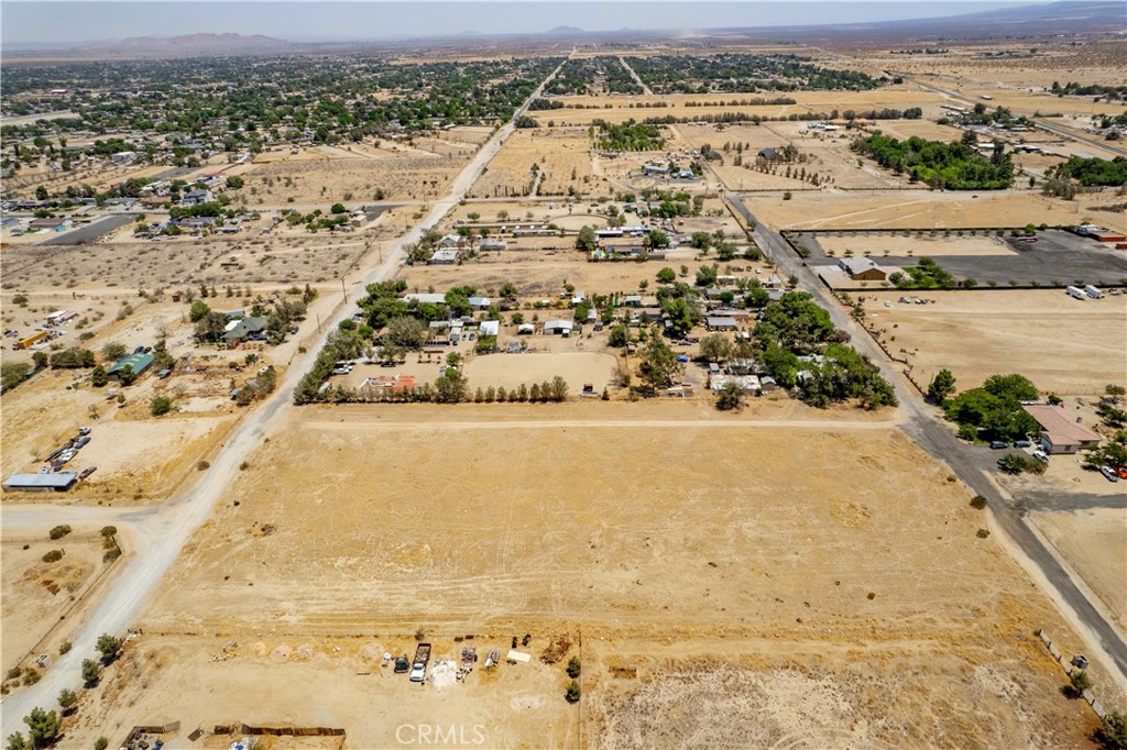 Per property profile address is: Ave S8/Vic Dunford, Sun Village 93543. 5 acres in a great neighborhood/rural community that sits along highway 138 in Littlerock. Neighborhoods consist of ranches, small farms. Per the Los Angeles County the property is zoned LAC21000 Agriculture. Lot is surrounded by Single Family Homes. Come and build your home or homes...