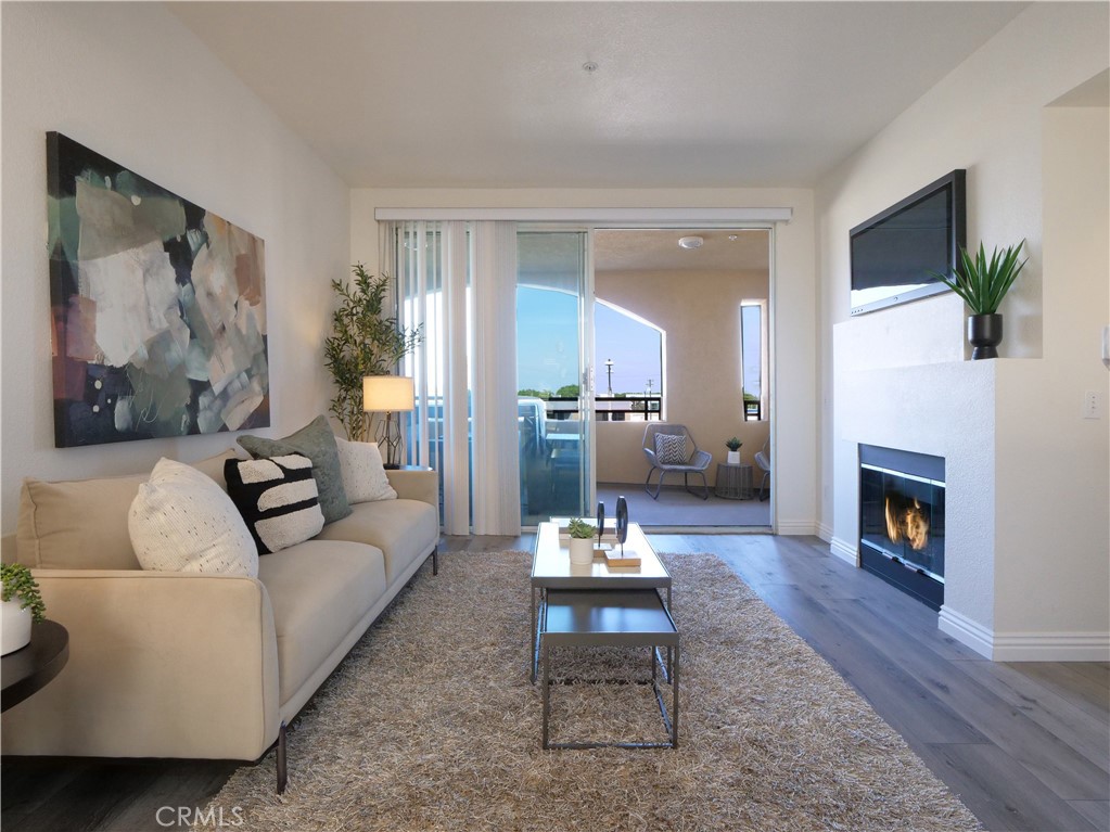 A fantastic opportunity to own this recently remodeled move-in ready, 2 bedrooms, 2 bathroom End unit condo in the desirable Brisas Del Prado complex. Located in the heart of Old Torrance with tons of restaurants and retail shops, steps away! This unit is situated perfectly in the complex so you can enjoy private third floor views safely away and far above the street level activity. Condo boasts lots of natural light and it has an open floor concept with kitchen, living room and dining area, Laminate flooring and recessed lightings. The completely remodeled kitchen features Quartz countertops, White cabinets, a lovely breakfast bar and high-end appliances. Adjacent is the bright living area with a gas fireplace, large sliding glass doors that lead to a large private covered patio where you can enjoy outdoor dining and entertaining. The two bedrooms are on opposite sides of the condo offering privacy to all occupants and both have siding glass doors with direct access to the spacious patio. Master bedroom includes his and her closets and an en suite bathroom featuring double sinks. This unit includes central AC and heat, in-unit washer & dryer, and comes with 2 full size parking spaces assigned back to back ( G2 floor, B05 ) conveniently located by the elevators in a gated subterranean parking and comes with private storage unit ( only included in a select number of units in the complex). Enjoy additional community perks such as gated entry, two elevators, a pool, a spa, an exercise room, recreation room, and guest parking in the underground lot. HOA includes Water, Hot Water and Trash. Don't miss this rare opportunity to own your very own home in Brisas Del Prado.