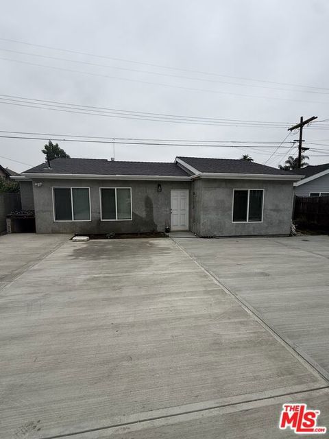 Photo of 4049 Halldale Avenue, Los Angeles, CA 90062 (MLS # 26837249)